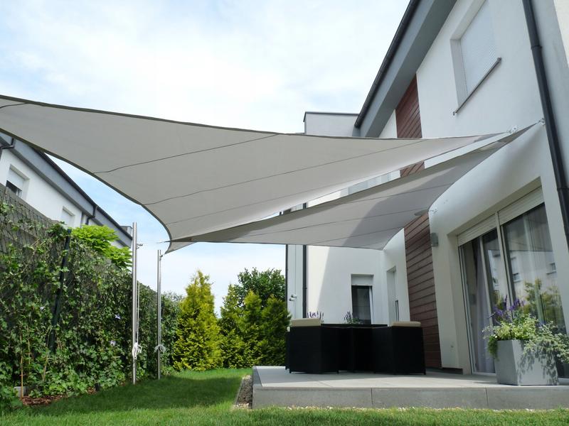 Praktyczny przewodnik: jak skutecznie zamontować żagiel przeciwsłoneczny w swoim ogrodzie